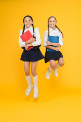 Back to school. Bring child school few days prior play playground and get comfortable. Cheerful school girls. Point out positive aspects starting school create positive anticipation first day class