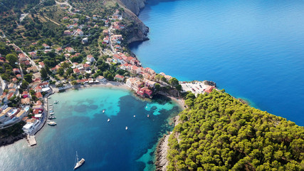 Fototapeta premium Aerial drone bird's eye view photo of beautiful and picturesque colorful traditional fishing village of Assos in island of Cefalonia, Ionian, Greece
