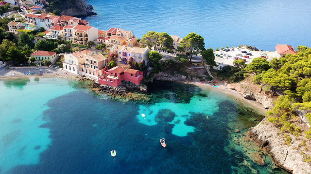 Aerial drone bird's eye view photo of beautiful and picturesque colorful traditional fishing village of Assos in island of Cefalonia, Ionian, Greece © aerial-drone