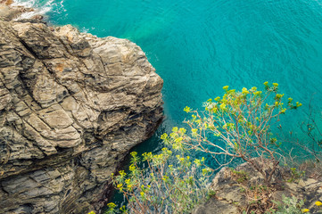 Cinque Terre, Italy - romantic travel destination with steep cliffs over sea