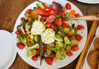 Greek salad on a table in Crete - Greece 
