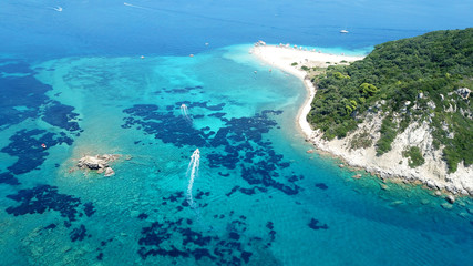 Aerial drone photo of tropical Caribbean bay with white sand beach and beautiful turquoise and sapphire clear sea