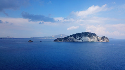Aerial drone photo of famous white caves and sandy beach in small island of Marathonisi and beautiful turquoise seascape, Zakynthos island, Ionian, Greece