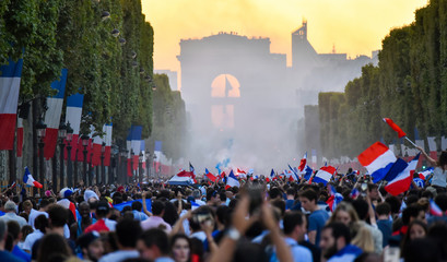 PARIS, France – July 15, 2018 : thousands of jubilant french fans on the Avenue des...