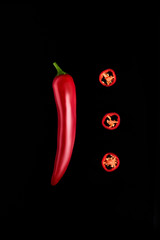 Seamless pattern with red hot chili peppers. Vegetables abstract background. Food collage, slicing hot red chili peppers Red hot chili peppers on a black background.