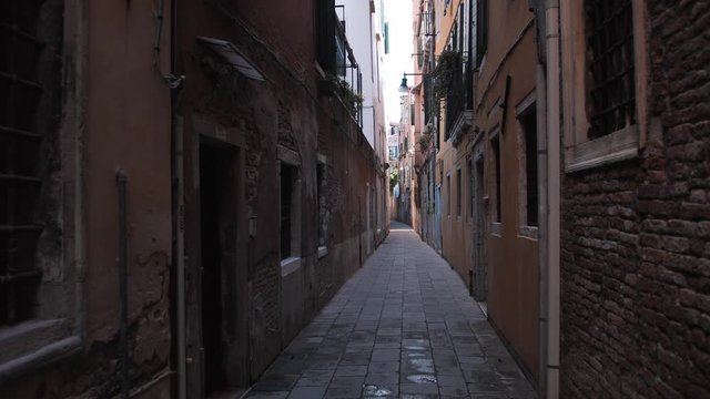 Empty narrow cozy street in Venice