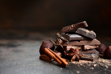 Stack of chocolate slices with spices.