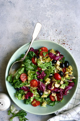 Vegetable salad with griklled chicken. Top view with copy space.