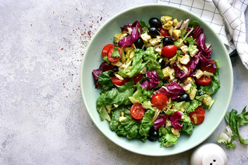 Vegetable salad with griklled chicken. Top view with copy space.