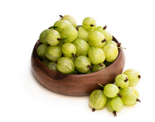Gooseberries in wooden table isolated on white