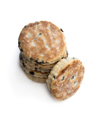 Stack of iced Welsh cakes isolated on white