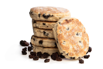 Stack of iced Welsh cakes isolated on white
