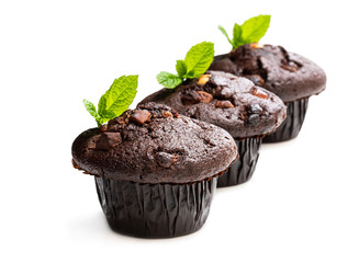 Triple chocolate muffins isolated on white