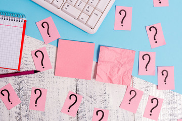 Writing tools, computer stuff and math book sheet on top of wooden table