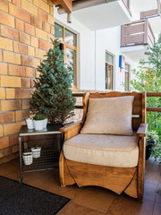 Soft chair base tree on street with a table and Christmas tree