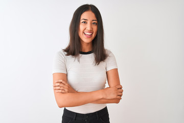 Young beautiful chinese woman wearing casual t-shirt standing over isolated white background happy face smiling with crossed arms looking at the camera. Positive person.