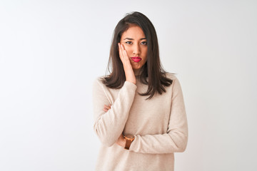 Beautiful chinese woman wearing turtleneck sweater standing over isolated white background thinking looking tired and bored with depression problems with crossed arms.