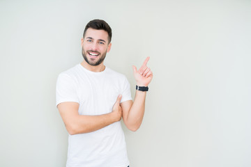 Young handsome man wearing casual white t-shirt over isolated background with a big smile on face,...
