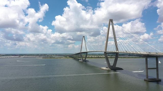 Drone view of Arthur Ravenel Jr. suspension bridge in Charleston Harbor, South Carolina. Drone flies forward.