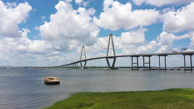 Drone view of Arthur Ravenel Jr. suspension bridge in Charleston Harbor, South Carolina. Drone flies forward and up.