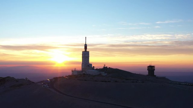 Mont Ventoux amazing colorful sunset with sun flare over the antenna Vaucluse France 