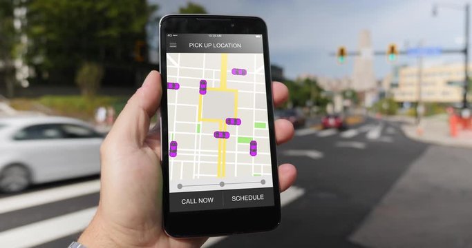 A man holds a smartphone running a ride sharing app. The screen shows nearby cars available. Fictional interface.  	