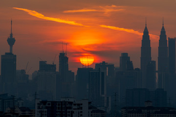 KUALA LUMPUR, MALAYSIA - 11th AUGUST 2019; Cloudy and haze sunset view over down town Kuala Lumpur, Malaysia.