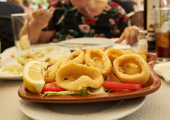 cook grilling food on the barbecue