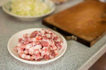 Fototapeta na wymiar cut raw pork on wooden table