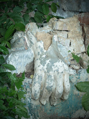 Broken and old Buddha image hand in Thailand