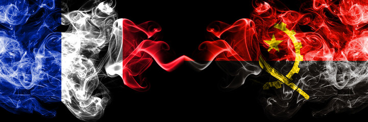 France vs Angola, Angolan smoky mystic flags placed side by side. Thick colored silky abstract...