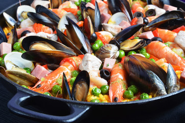 Seafood paella in the fry pan