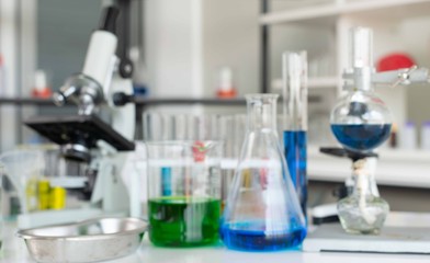 Microscopes and scientific test tubes in the laboratory.