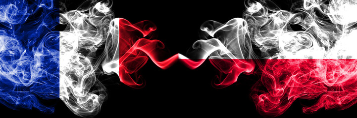 France vs Poland, Polish smoky mystic flags placed side by side. Thick colored silky abstract smoke banner of French and Poland, Polish