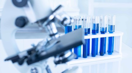 Microscopes and scientific test tubes in the laboratory.