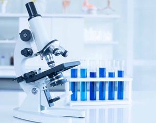 Microscopes and scientific test tubes in the laboratory.