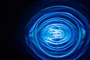 Sound waves in the dark. Blue color