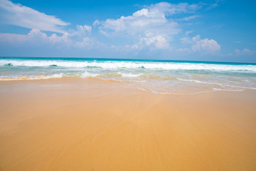 Fototapeta na wymiar Sea wave beach sea shore on white sand beach