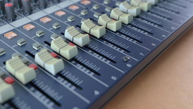 Professional audio mixer with many channels, Musical player for tuning of stage close up