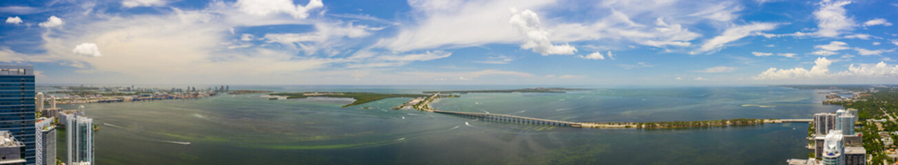 Beautiful aerial panorama of Brickell Bay. Scene includes water bridges and harbor overlooking Key...
