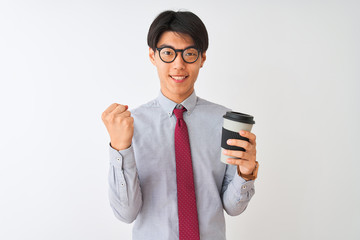 Chinese businessman wearing tie and glasses drinking coffee over isolated white background screaming proud and celebrating victory and success very excited, cheering emotion