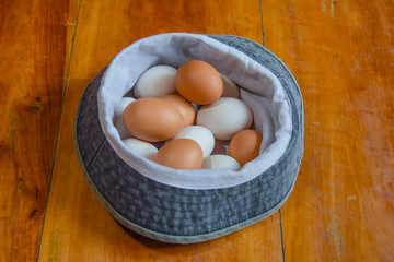 Eggs are put in the cloth to prepare breakfast.
