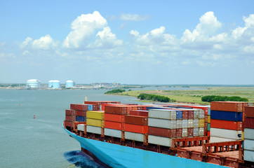 Cargo container ship entering port of Savannah, Georgia.