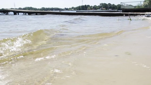 Waves breaking at the shoreline