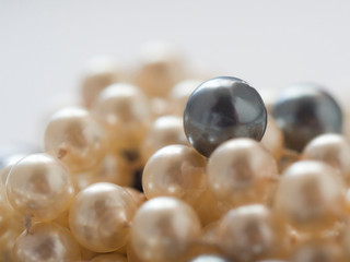 Pile of black and white pearls
