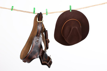 Cowboy Hat and Belt On A Clothesline
