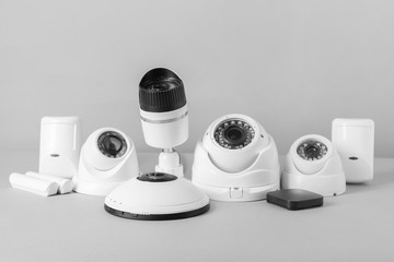 Different equipment of security system on grey background