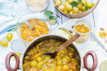 Cooked plums in the pot, prepared plums  for pouring into the jars, food and healthy eating concept