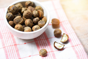 Chestnuts uncooked in bowl on the table / genus Castanea or thai and Japanese Chestnut Asian