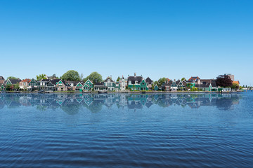 Rural houses with lake and clear sky in Netherlands 